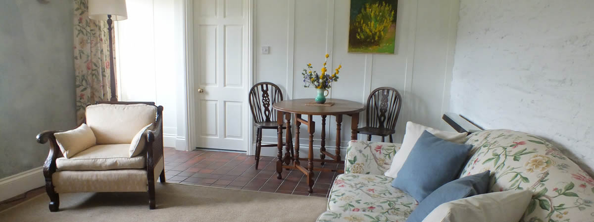 Comfortable lounge with dining area at The Count House